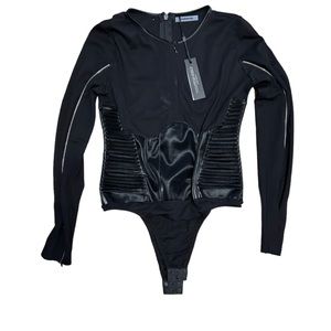 Black body suit with zipper detail on sleeves